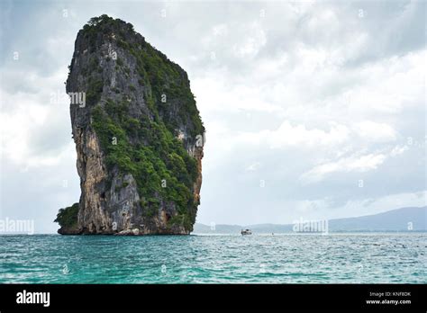 Rock Formation Protruding From Sea Phuket Thailand Asia Stock Photo