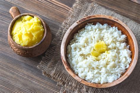 Premium Photo Bowls Of Rice And Ghee Clarified Butter