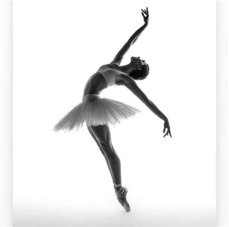 A Black And White Photo Of A Ballerina