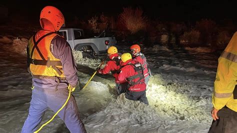 California crews rescue family from SUV engulfed by raging floodwaters ...