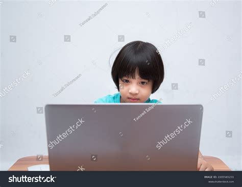 Cute Smart Asian Boy Happily Using Stock Photo 2205565231 Shutterstock