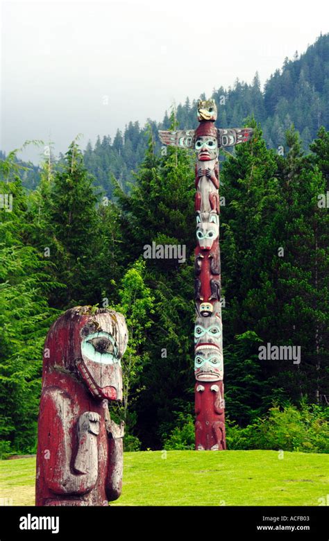 Totem poles in Saxman Village near Ketchikan Alaska Stock Photo - Alamy