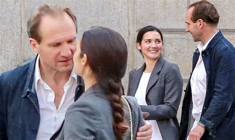 Ralph Fiennes Gets Cosy With Pretty Brunette As He Takes A Break From