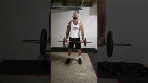 Shrug à la barre barbell shrug VIDÉO Papa Muscle