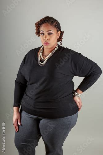 Mature Plus Size African American Woman With Natural Locks Posing In