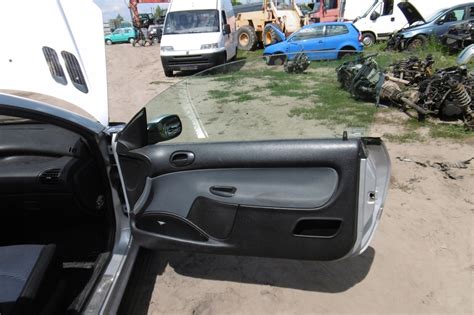 PODNOŚNIK SZYBY PRAWY PEUGEOT 206 CC ELEKTRYCZNY 8305137844