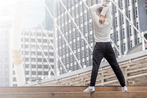 Fitness Man Stretching Hands In Urban City Sport Exercise Workout