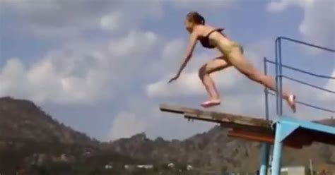 Bikini Clad Girl S Epic Fail As She Attempts To Perform Sexy Dive Off Wooden Plank Mirror Online