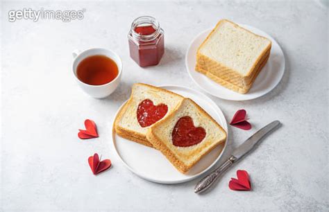 Sweet Sandwiches With Strawberry Jam With Heart Shape Inside For