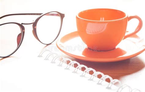 Close Up Of Coffee Cup With Book And Eyeglasses Stock Image Image Of Break Office 65296111