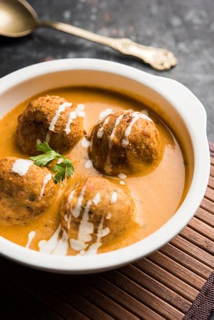 Premium Photo Malai Kofta Curry Is A Mughlai Special Recipe Served In