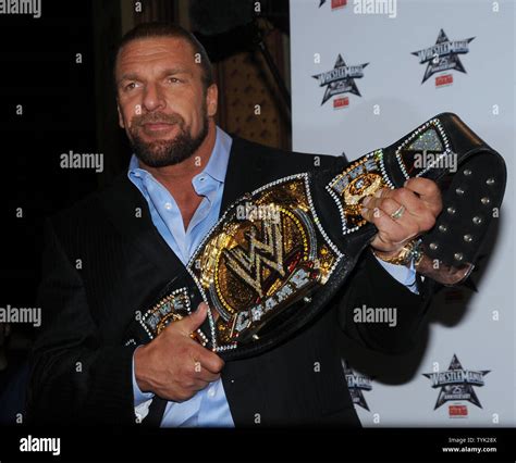 WWE Champion Triple H attends a press conference at New York's Hard ...