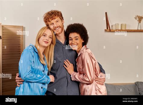 Polyamory Lovers In Pajamas Happy Man With Red Hair Hugging