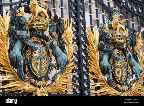 The Royal Coat Of Arms On The Gates Of Buckingham Palace London