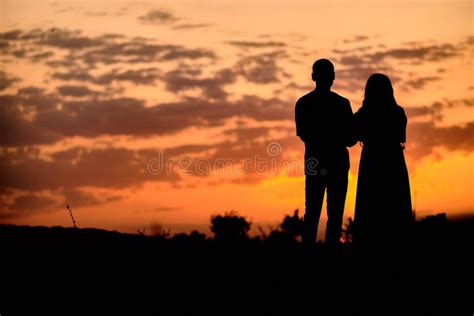 Silhouette Photo of Couple at Sunset Stock Photo - Image of person, beautiful: 262245664