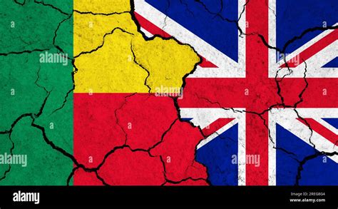 Flags Of Benin And United Kingdom On Cracked Surface Politics