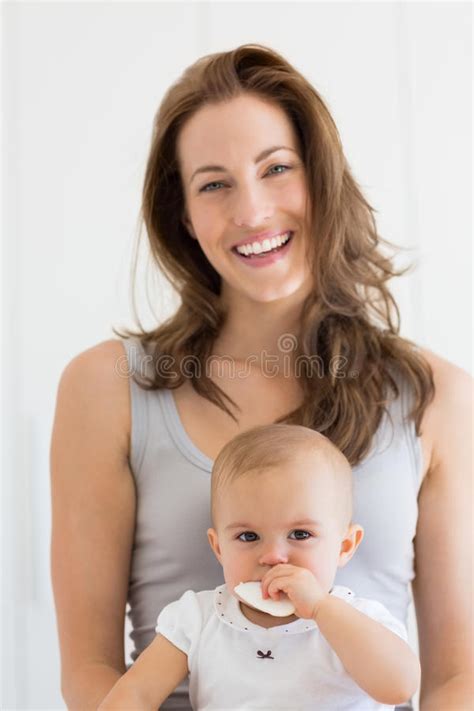 Closeup Portrait Of A Smiling Mother And Baby Stock Photo Image Of