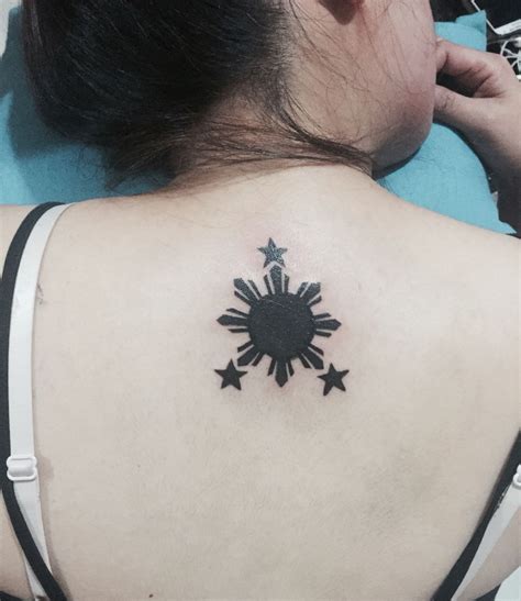 3 Stars And A Sun Tattoo