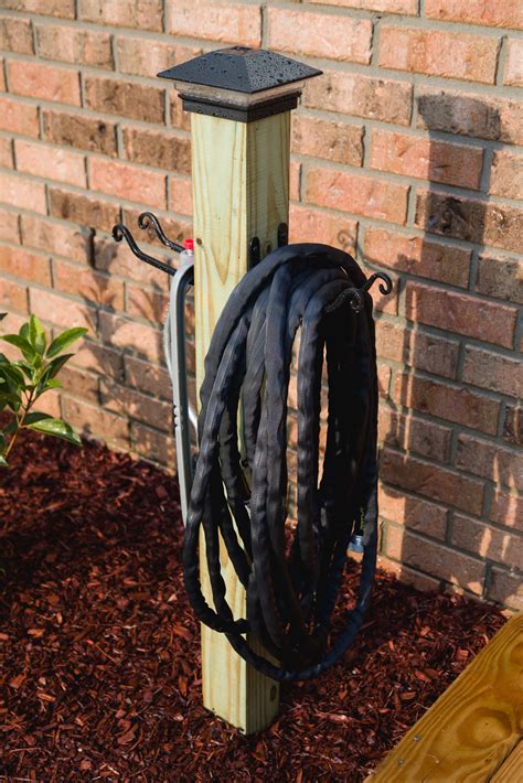 How To Build A Diy Garden Hose Holder Store Garden Hoses Hose Post