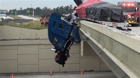 111422 18 Wheeler Crash Sends Truck Over Overpass Onto Roadway Below