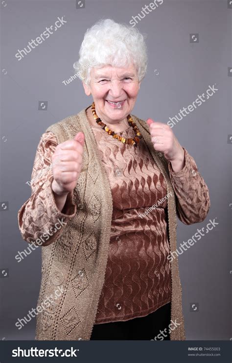 Smiling Old Woman Fight Pose Isolated ภาพสต็อก 74455003 | Shutterstock