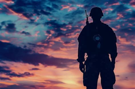 Premium Photo | Solemn Soldier Silhouette for Memorial Day with Dusky Sky