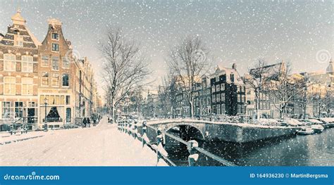 Winter Snow View of a Dutch Canal in Amsterdam Stock Photo - Image of ...