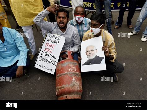 Indias Congress Party Workers Burn A Picture Of Indias Prime Minister