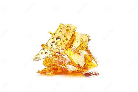 Yellow Wax Piece With High Thc Isolated On White Background Stock Photo