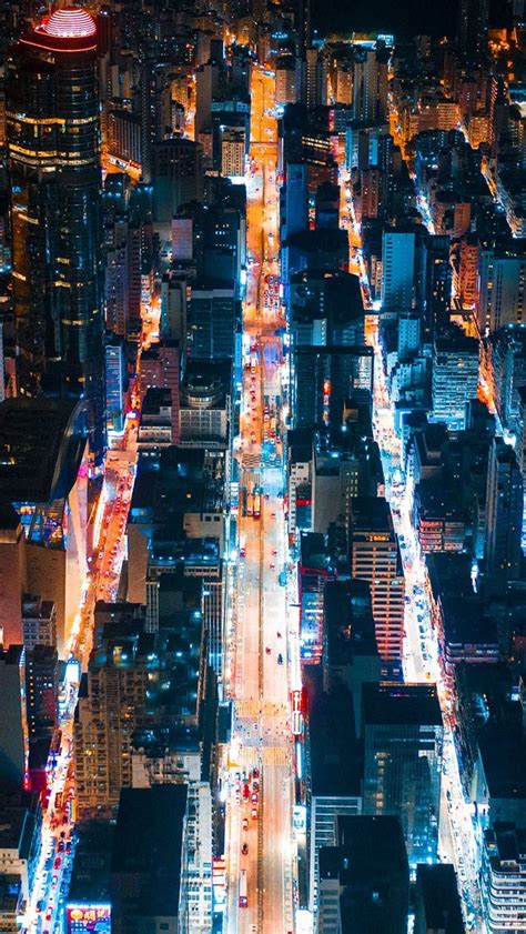 Aerial View Of City Buildings During Night Time Iphone Wallpapers Free