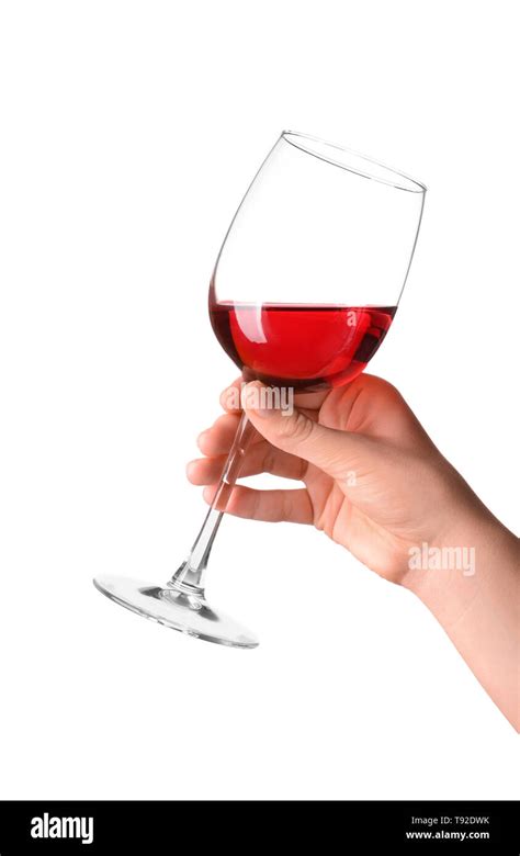 Female Hand Holding Glass With Tasty Wine On White Background Stock