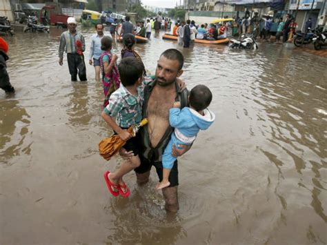 Flood Fury Continues In Gujarat Rajasthan And Assam Top