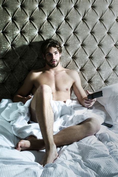 Man In Bed Naked Male Model Guy Lying Alone In Bedroom Stock Photo