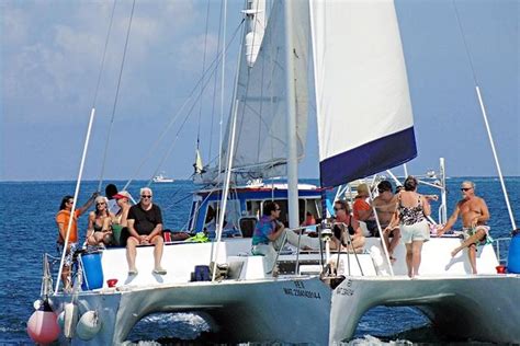 "FE" Catamaran Sail And Snorkel Tour In Cozumel: Triphobo