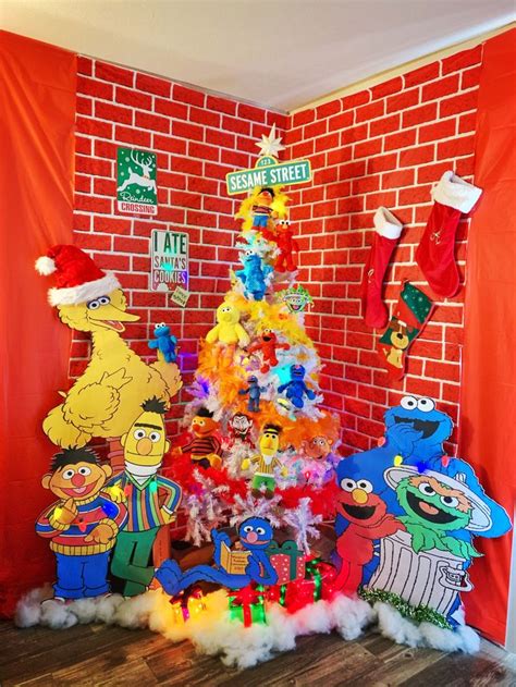 The Christmas Tree Has Been Decorated With Sesame Street Characters And