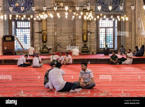 Istanbul Turkey Turkiye Men Resting And Talking In The Mosque Of