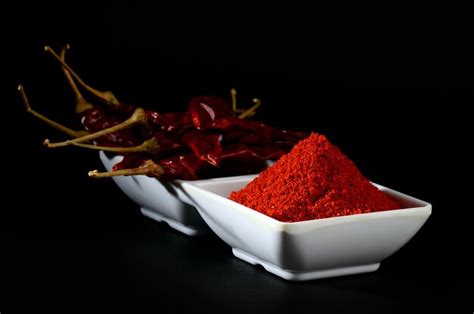 Premium Photo Chilly Powder With Red Chilly In White Plate Dried