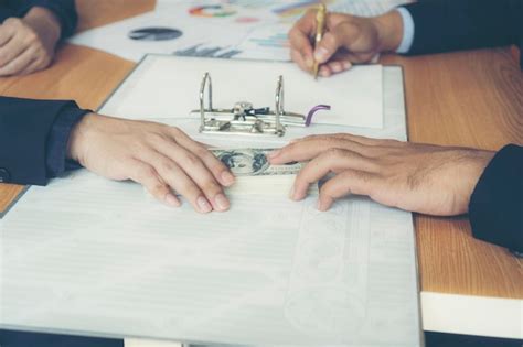 Premium Photo Close Up Of Business Colleagues Working In Office