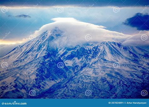 The Top Of Mount Ararat Is Covered With Snow And Clouds Stock Image