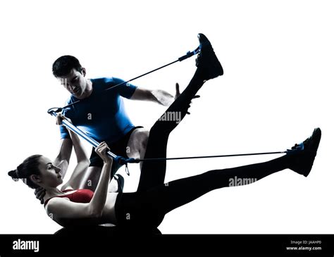 Personal Trainer Man Coach And Woman Exercising Gymstick Silhouette