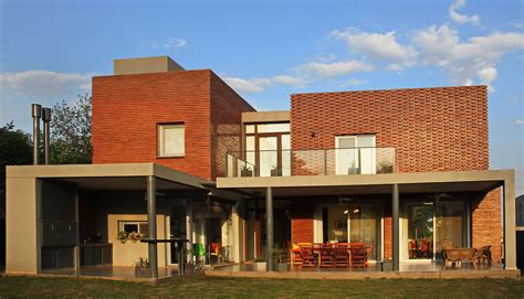 Una Vuelta De Ladrillo Concrete Architecture Brick Mansions House