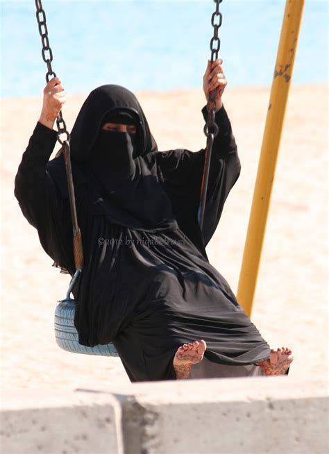 Barefoot In Niqab On Swing Piercing Ears At Home Piercing Face