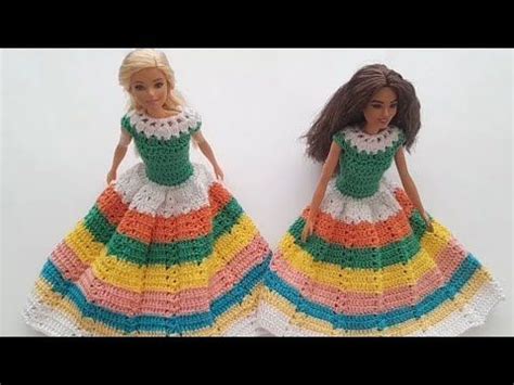 Two Crocheted Doll Dresses Made To Look Like Barbies