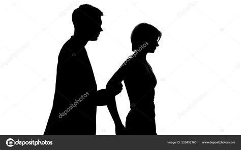 Male Holding Female Stopping Walking Away Conversation Crisis Stock