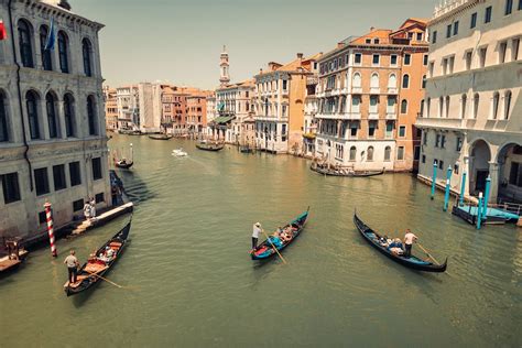 Tourists Riding a Gondola in the Venice Grand Canal · Free Stock Photo