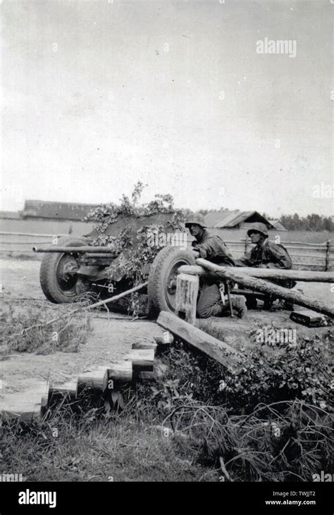 Waffen Ss Troops In Camouflage Smocks With A Light Pak Anti Tank Gun In