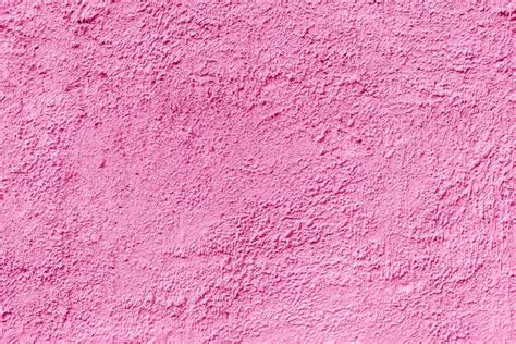 Parede De Edifício Em Gesso Com Textura Rosa áspera Abstrata Foto Premium