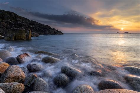 Sunset Stones Sea Horizon Sky HD Wallpaper Peakpx