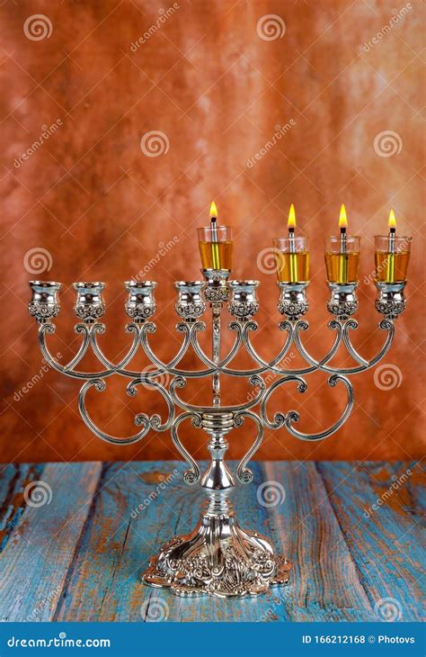 Lights Candles On The Third Day Of The Jewish Holiday Hanukkah Candles