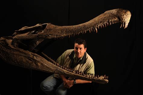 Paleontologist Paul Sereno poses with the skull of SARCOSUCHUS IMPERATOR. : r/Naturewasmetal